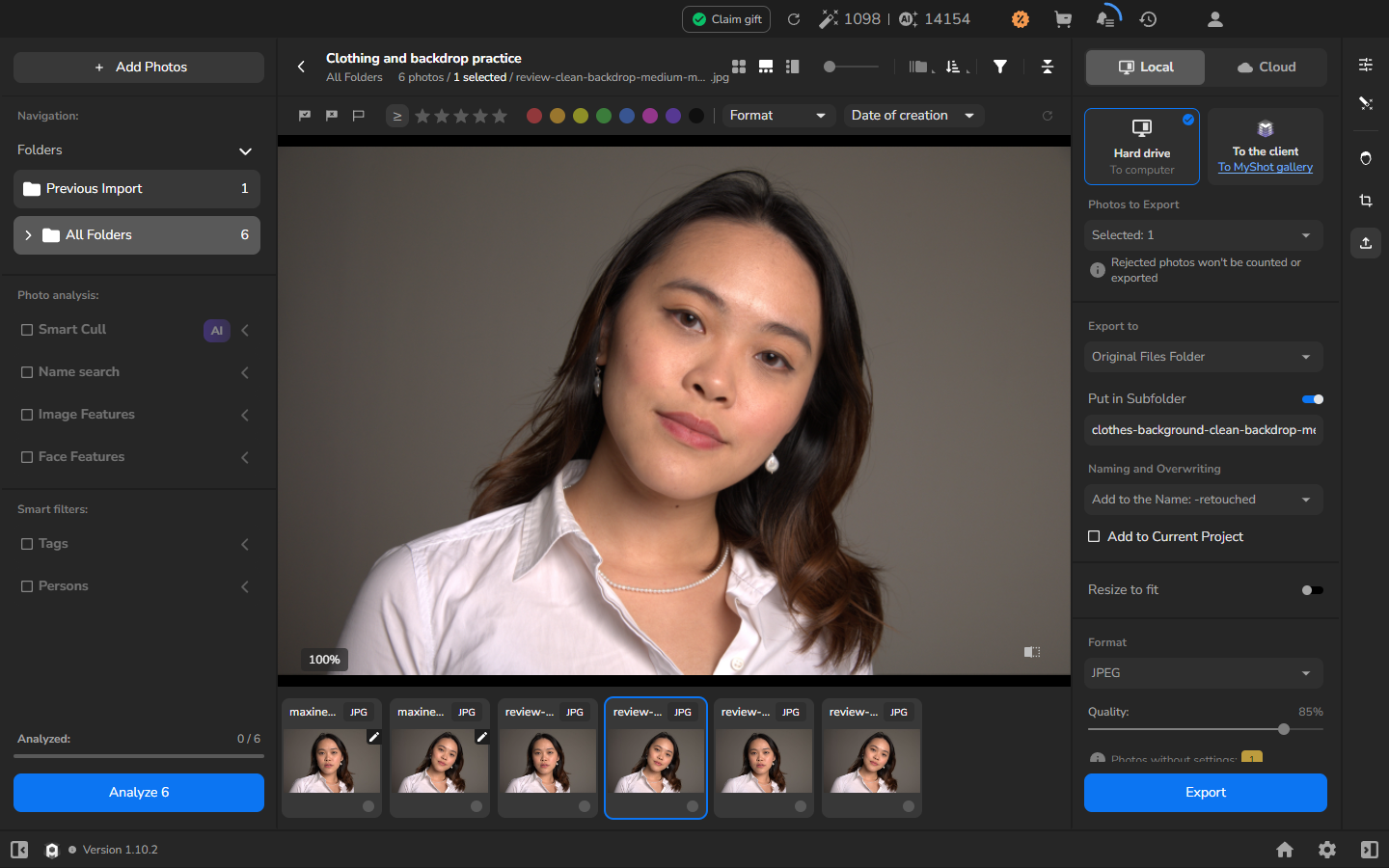 The Clean-Backdrop-only full-resolution review copy at 100%, with the small background mark removed and the original shirt folds retained.
